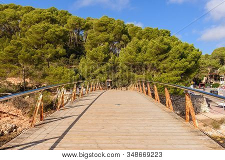Menorca, Spain - October 14, 2019: Footbridge In Cala Galdana, A Popular Tourist Resort On The Islan