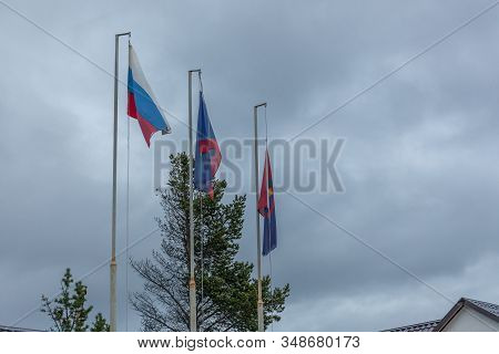 Russian Federation Flag, Murmansk Region Flag, Sami Flag.