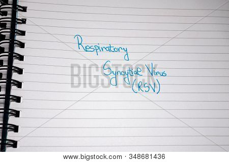 Respiratory Syncytial Virus Rsv Handwriting  Text On Paper, On Office Agenda. Copy Space.