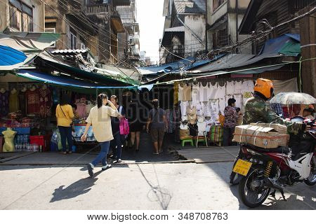 Thai People Walking Select And Buying Fabric Material With Accessories From Garment Shop In Sampeng