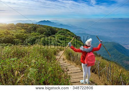 Young People Walking On A Hilltop In Doi Inthanon, Chiang Mai, Thailand