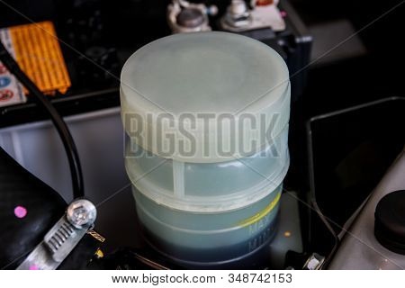 Power Steering Oil Reservoir Of The Car