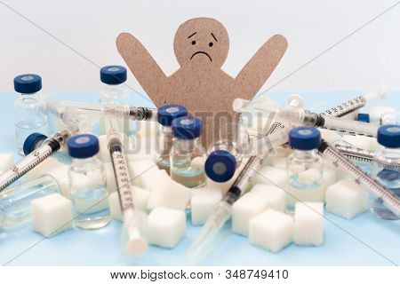 Sugar Addiction, Insulin Resistance, Unhealthy Diet, Figure Of A Cardboard Man Surrounded By Refined