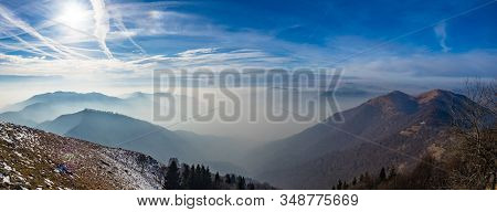 Panoramic View On Lombardy Prealps In Foggy Winter Day, Lombardy, Italy