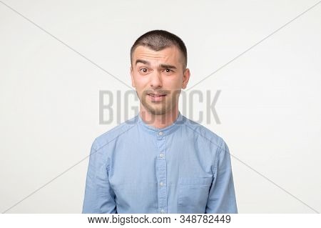 Doubtful Hispanic Man Looking With Disbelief Expression.