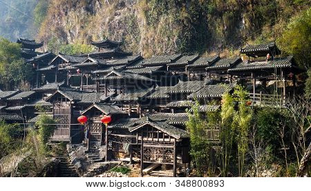 Yichang, Hubei / China - Dec 25 2019:  The Wooden Village Along With The Hill Beside The Yangtze Riv