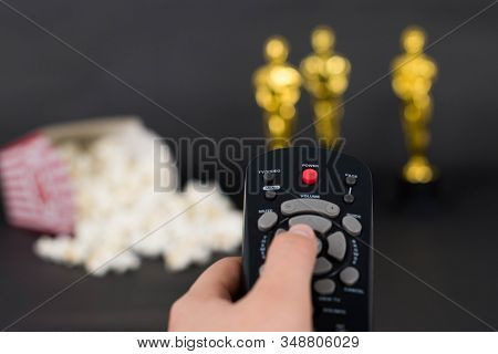 Xalapa, Veracruz, Mexico- January 31, 2020: Woman Hand Holding A Remote Control On A Blurred Backgro