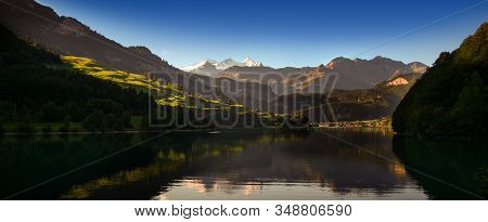 Lake Lungern Switzerland - Famous Fishing Lake In Switzerland. Reflection In Water