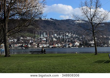 Calm Scene In Park In Zug, Switzerland, Lake Zug And City