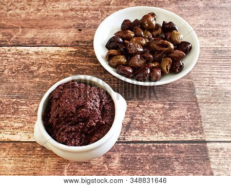 Pate Of Ligurian Taggiasche Olives On Wooden Background