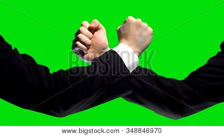 Business Confrontation, Fists On Green Screen Background, Market Competition