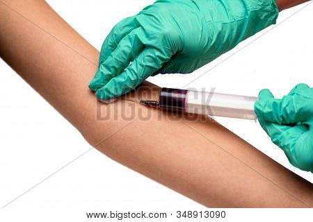 Closeup Of Female Hands Of Nurse Taking Blood Sample From Patient Isolated On White Background. Coro