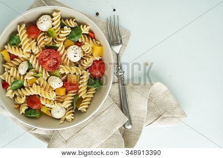 Pasta Salad With Mozzarella Cheese And Vegetables. Healthy Pasta Meal.