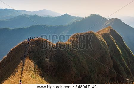 Beautiful Mountain With Trekkers In Sunset At Thong Pha Phum National Park Kanchanaburi Of Thailand 