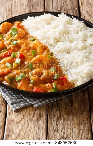Shrimp Etouffee  Juicy Dish Smothered In Rich And Flavorful Roux Sauce Served With Rice Closeup In A