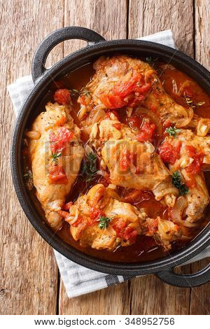 Andorran Cunillo Rabbit In Tomato Sauce Is A National Specialty Dish Closeup In A Pan. Vertical Top