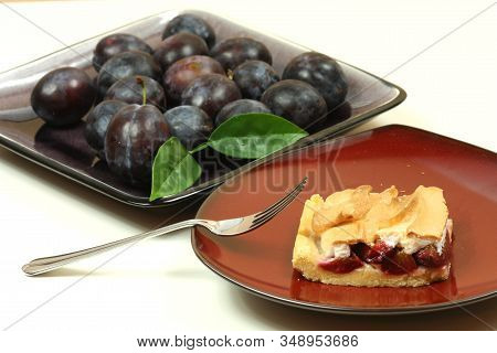 Plum Cake And Dish With Fresh Plums Isolated