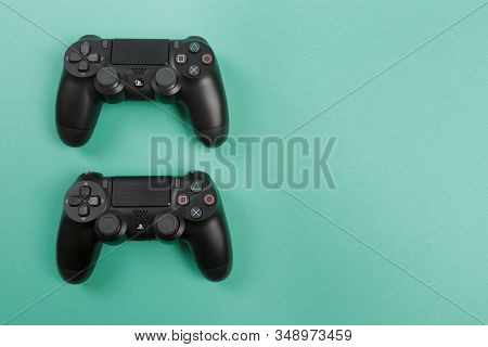 Russia, Oktober 24 2019: Game Joystick. Playstation. On A Blue Background Top View. The New Sony Dua