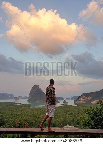 Young Men On Vacation In Thailand Visiting The Bay Of Phannga Famous For Its James Bond Island And V