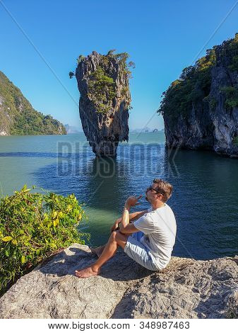 Young Men On Vacation In Thailand Visiting The Bay Of Phannga Famous For Its James Bond Island And V