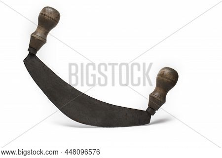 Close Up Of Old Rusty Herb Chopper Weighing Knife With Two Handles For Crushing Stale Bread On White