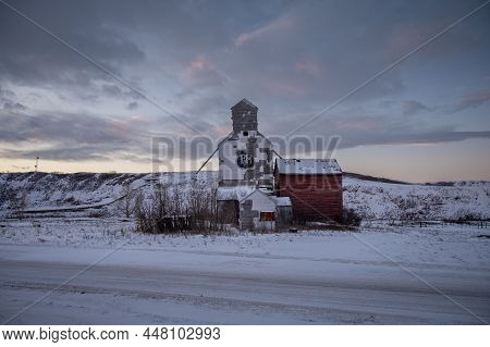 Sharples, Alberta - January 2, 2022: Old P&h Grain Company Elevator In The Ghost Town Of Sharples, A