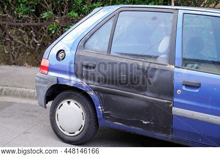Car Old Bodywork With Damage On Accident With Dent Old And Used Dented Striped Side Rear Door
