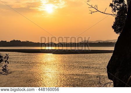 Sunset Orange Sky With River Island Backdrop At Dusk Image Is Taken At Peacock Island Guwahati Assam