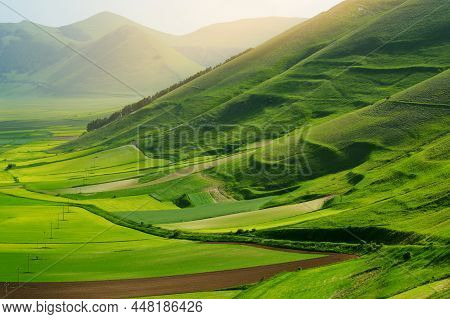 Piano Grande, Large Karstic Plateau Of Monti Sibillini Mountains And One Of The Greatest Tourist Att