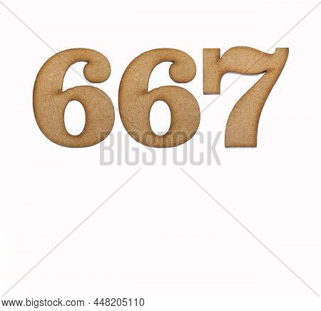 Number 667 In Wood, Isolated On White Background