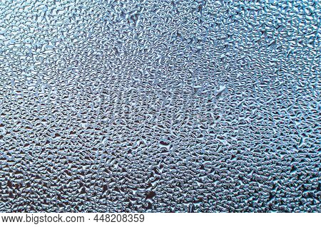 Condensation On The Clear Glass Window. High Humidity. Water Drops. Abstract Background Texture.