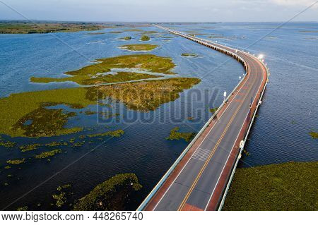 Aerial View Of Ekachai Bridge Or Chaloem Phrakiat 80 Phansa Bridge. Located In Thale Noi, Connect Be