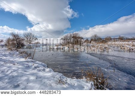 Landscape With Frozen Small Pond. Czech Beautiful Highland Vysocina European Countryside