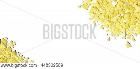 Closeup Chemical Ingredient On White Laboratory Table (top View). Sodium Sulfide Flakes, A Yellow Ap
