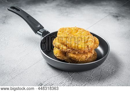 Fried Hash Brown Potato, Hashbrown Fritters In A Skillet. White Background. Top View