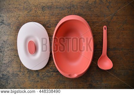 Pahang, Malaysia : 18th October 2020 - Tupperware Serving Set With Wood Table Background
