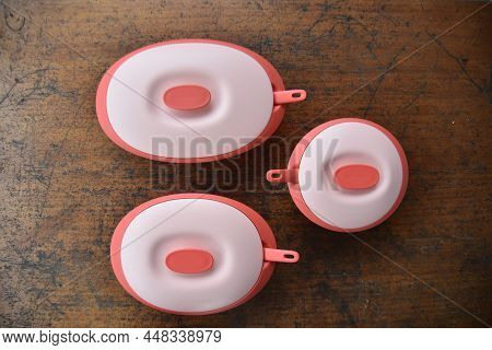 Pahang, Malaysia : 18th October 2020 - Tupperware Serving Set With Wood Table Background