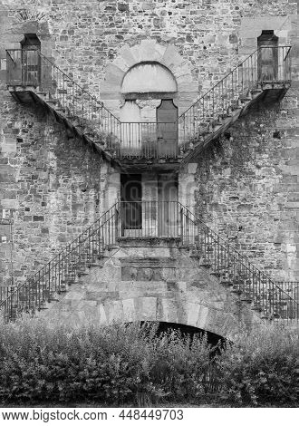 Exterior Of Antique Building With Escher Architecture Style. Simmetry And Geometric Perspective.