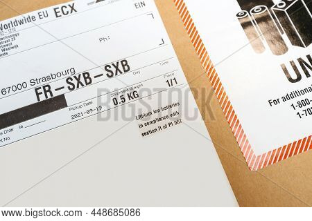 Paris, France - Sep 25, 2021: Express Worldwide Eu Techpackage With Dhl Logotype From The Syncreon T