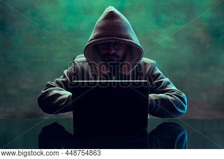 Portrait Of Man, Professional Programmer, Web Hacker Breaking Security System, Downloading Informati