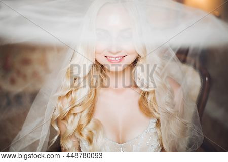 Charming Smiling Young Blondie Bride Looking At Camera.