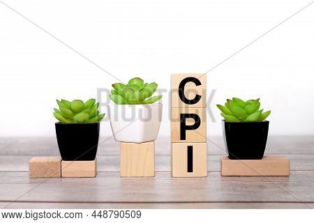 Consumer Price Index Cpi Concept On A Wooden Table On Three Wooden Blocks Text