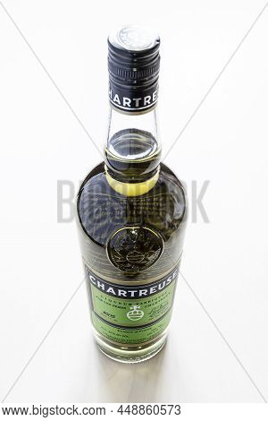 Moscow, Russia - February 3, 2022: Above View Of Closed Bottle Of Green Chartreuse Liqueur On Pale T
