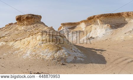 Zekreet Desert Natural Landscape With With Many Limestone Rocks.