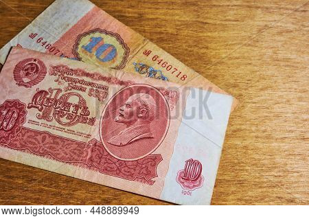 Vintage Soviet Banknotes On A Wooden Table