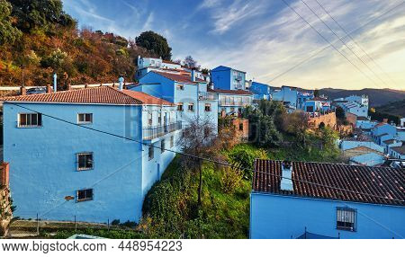 Picturesque Hillside Famous Juzcar Town Or Smurfs Village, All Residential Houses Painted Blue Color