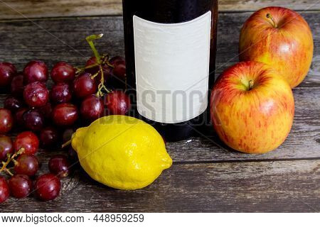 Chilled Wine Bottle With Blank Label With Fruits On The Side