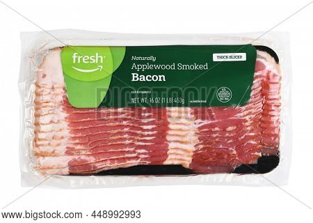 IRVINE, CALIFORNIA - 10 FEB 2022: A package of Amazon Fresh Applewood Smoke Bacon.
