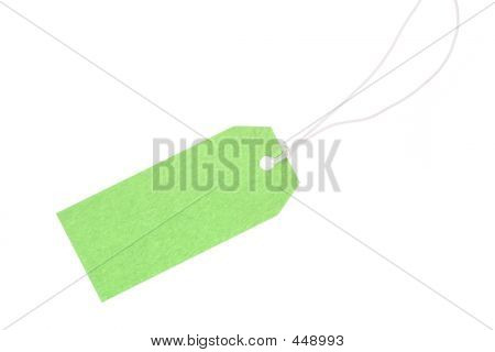 목화와 함께 녹색 선물 태그를 스레드