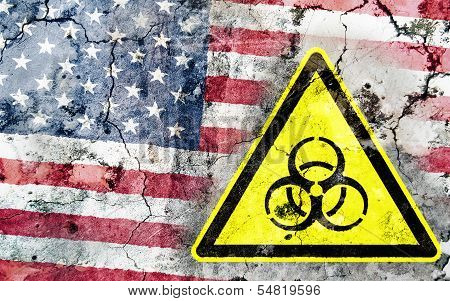 Old Cracked Wall With Biohazard Warning Sign And Painted Flag